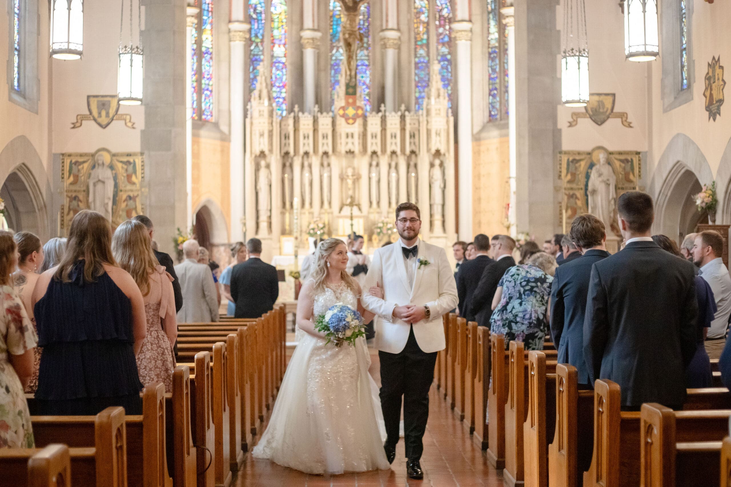 Traditional Latin Mass wedding ceremony the bride and groom exit 