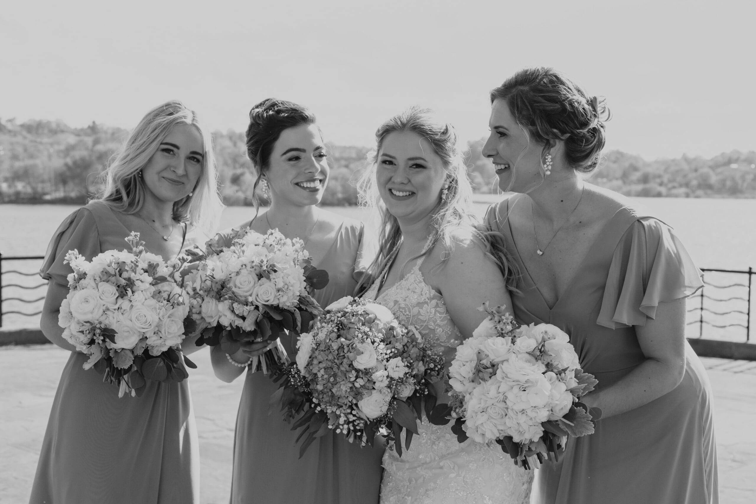 Bride and her bridesmaid featuring beautiful bridal bouquets 