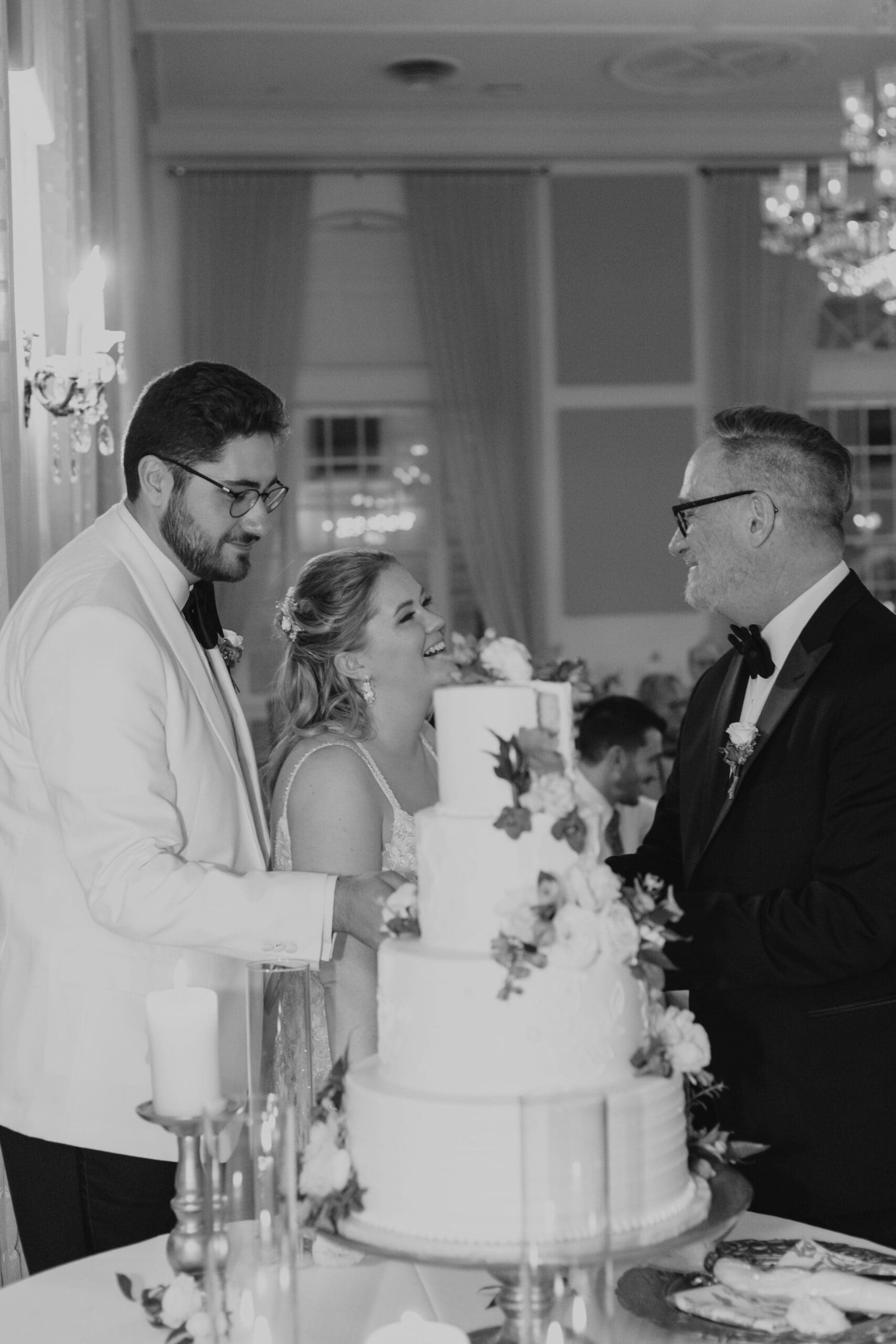 Bride and groom pictured receiving gift from the groom's father 